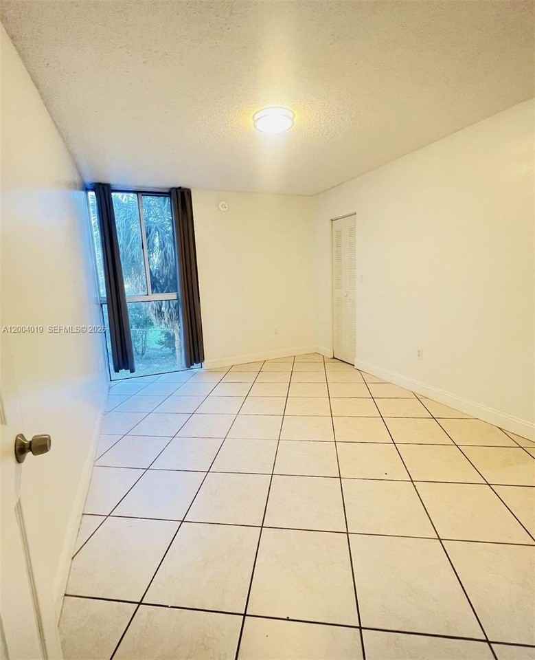 7075 Nw 186th St #C205 - Photo 4 of 4