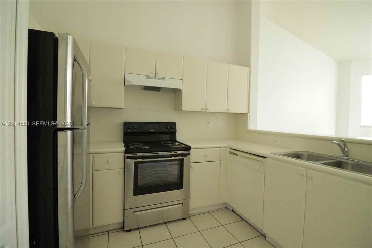 1568 Se 26th St #206 - Photo 3 of 11