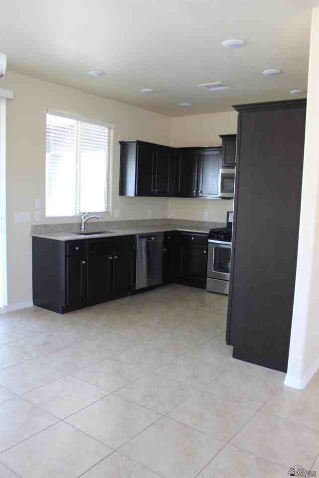 6572 E 35th Pl - Photo 4 of 12