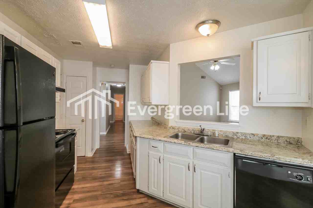 1251 Drawbridge Dr - Photo 7 of 15