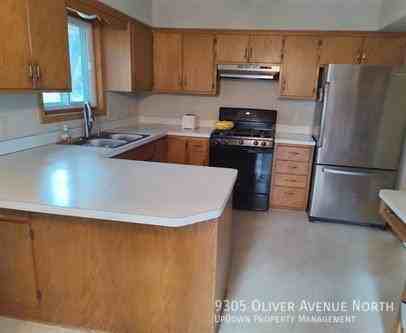9305 Oliver Ave N - Photo 4 of 18