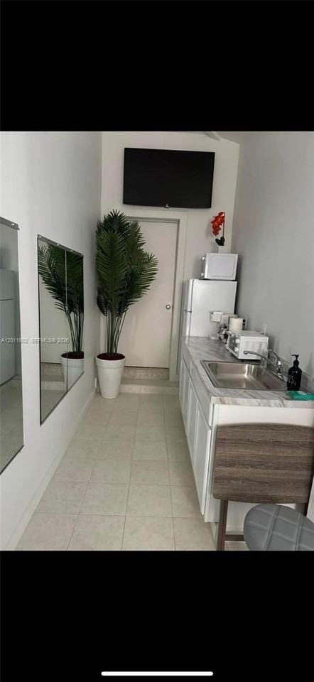 1160 Nw 193rd St #1 - Photo 2 of 3