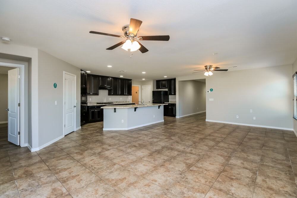 10826 E Calypso Ave - Photo 5 of 19