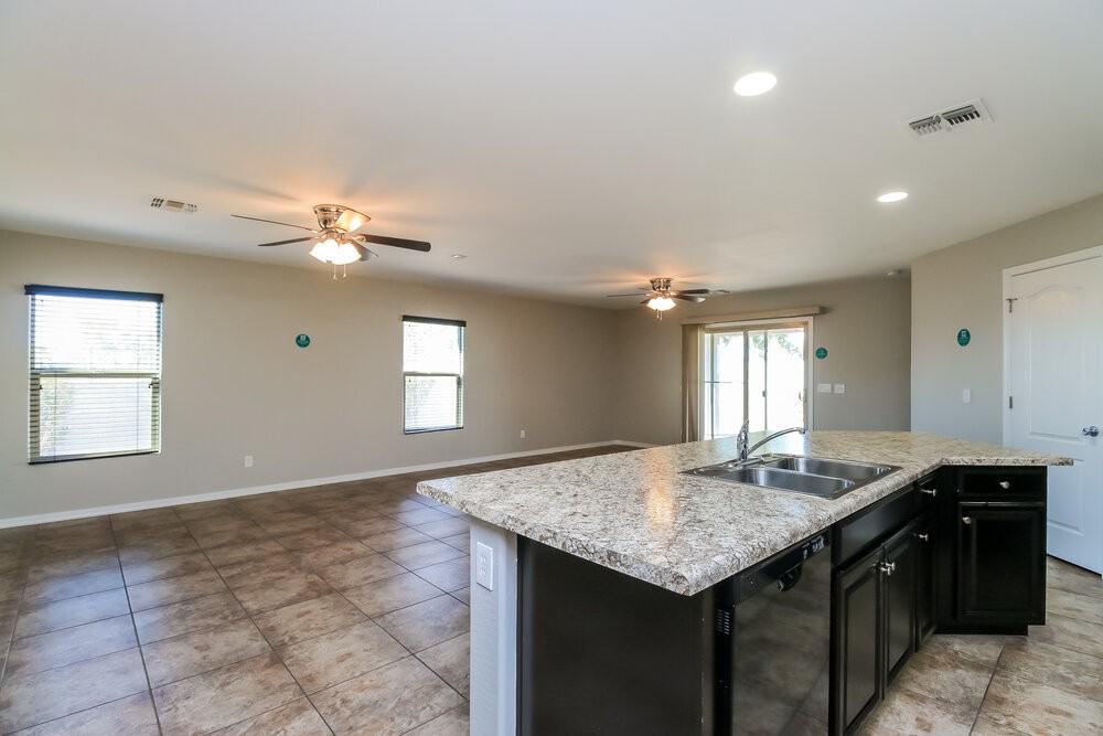 10826 E Calypso Ave - Photo 7 of 19