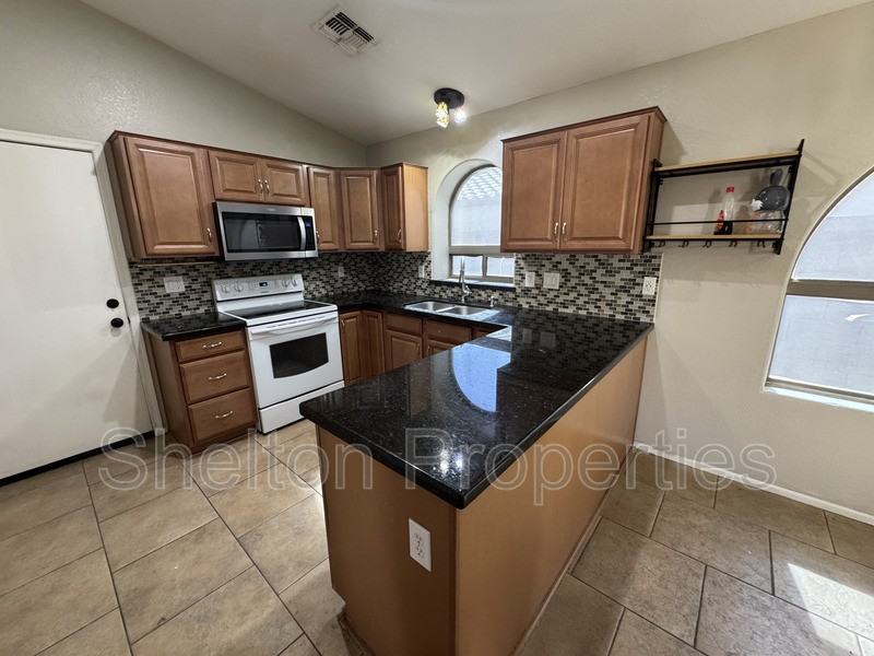 15828 W Latham St - Photo 2 of 17