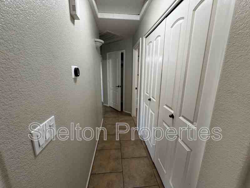 15828 W Latham St - Photo 5 of 17