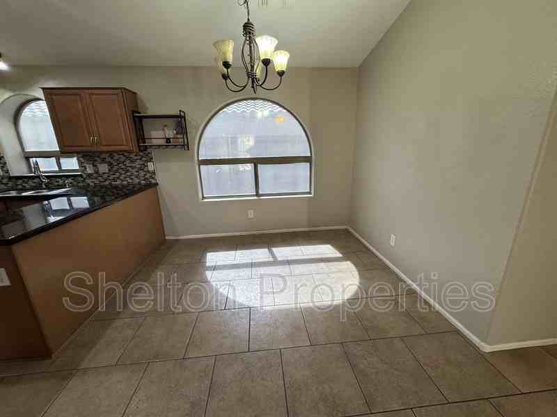 15828 W Latham St - Photo 6 of 17