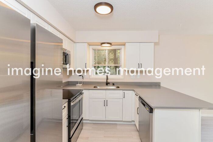 3409 83rd Ave N - Photo 6 of 17