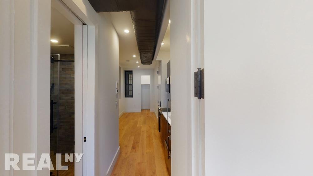 E 3rd St #11 - Photo 4 of 5