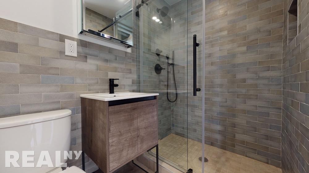 E 3rd St #11 - Photo 5 of 5