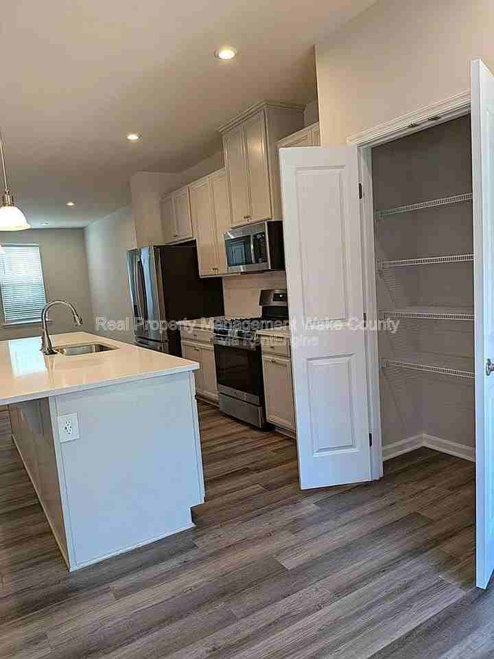 6608 Pathfinder Way - Photo 3 of 9