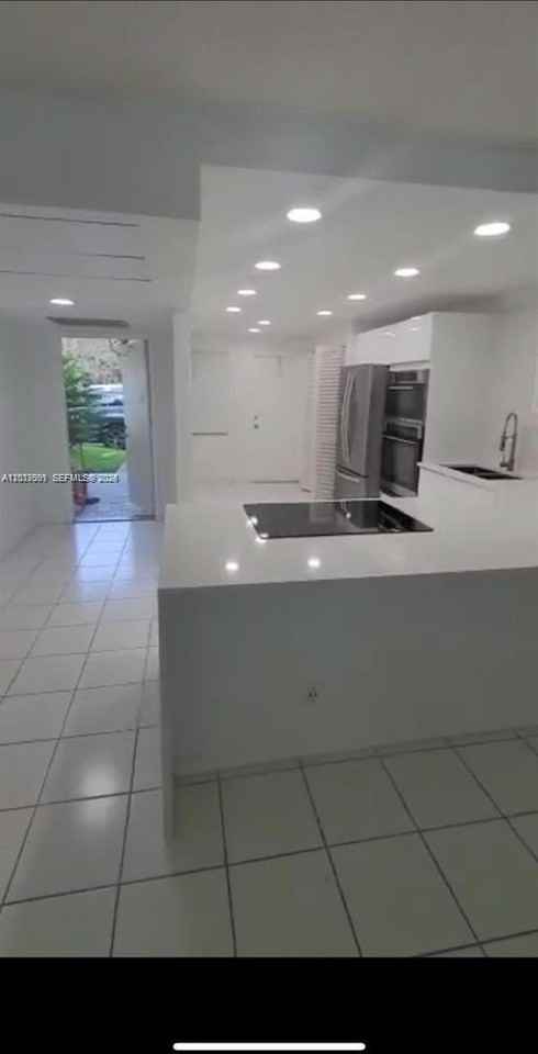 3145 N Palm Aire Dr #103 - Photo 2 of 8