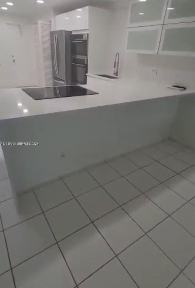 3145 N Palm Aire Dr #103 - Photo 3 of 8