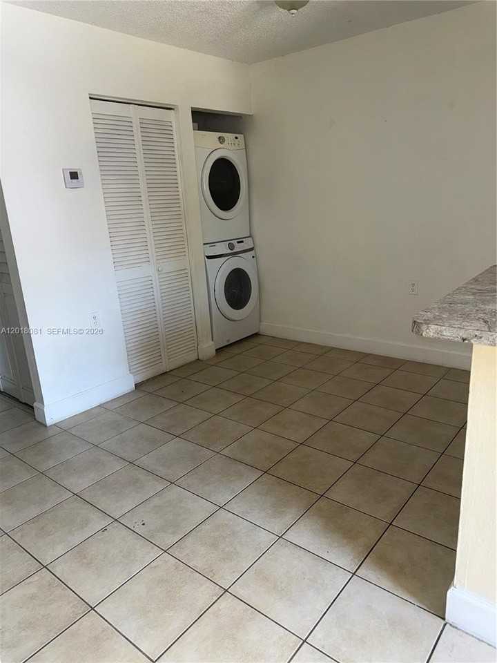 7120 Nw 179th St #105 - Photo 3 of 6