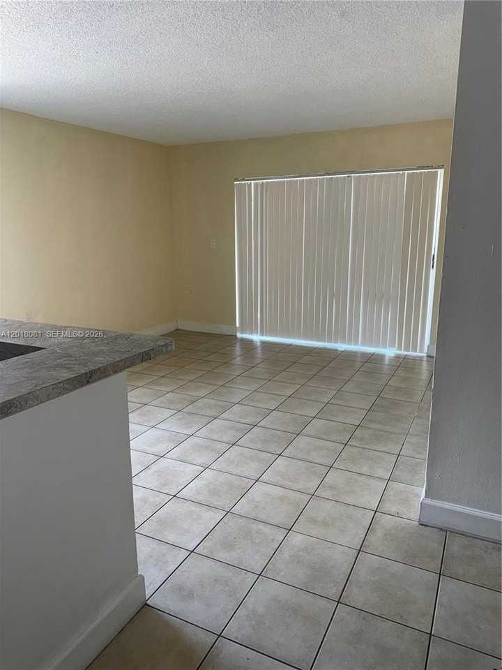 7120 Nw 179th St #105 - Photo 4 of 6