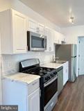 5822 9th St Nw #4 - Photo 1 of 1