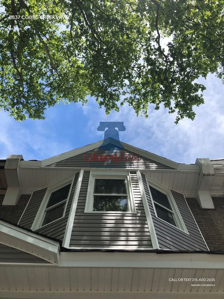 5837 Cobbs Creek Pkwy - Photo 2 of 5