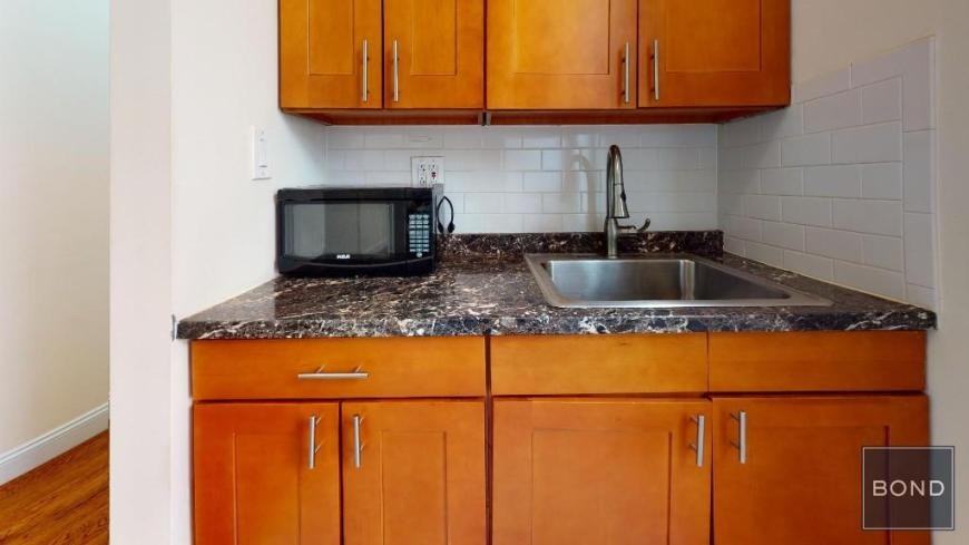 228 E 36th St - Photo 3 of 5