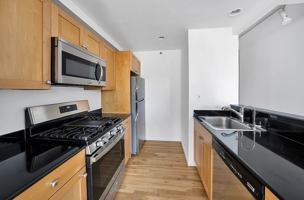 featured image of 416 E 11th St
