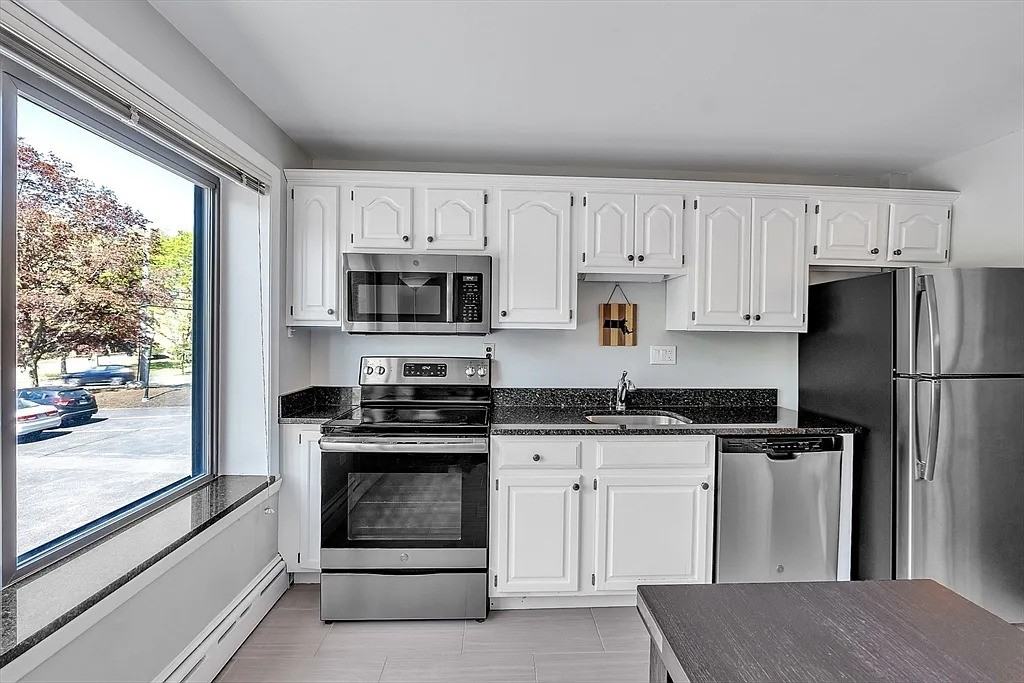 128 Pleasant St - Photo 6 of 14