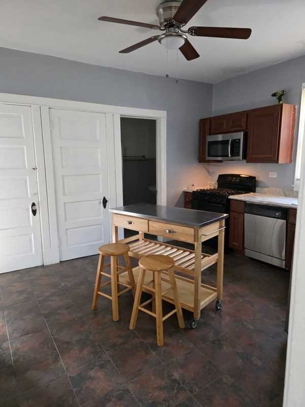 7748 S Saginaw Ave - Photo 3 of 6