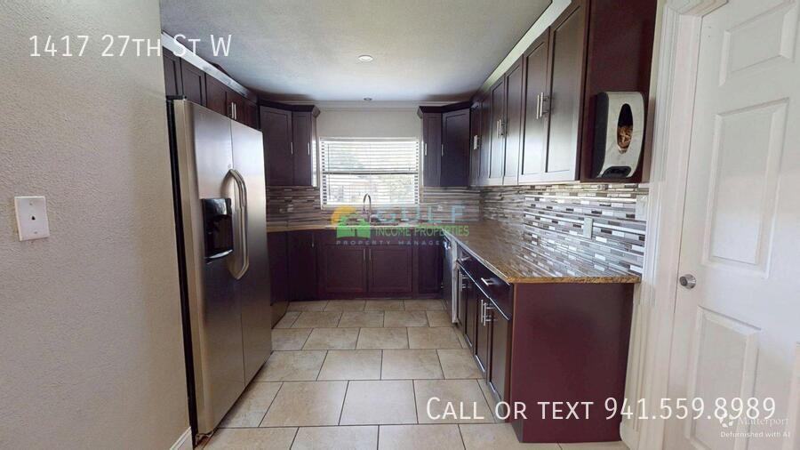 1417 27th St W - Photo 5 of 31