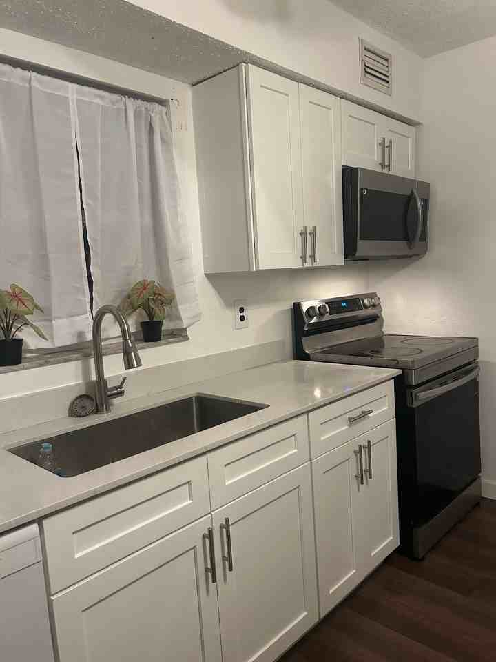 4940 87th Ave N #C - Photo 2 of 14