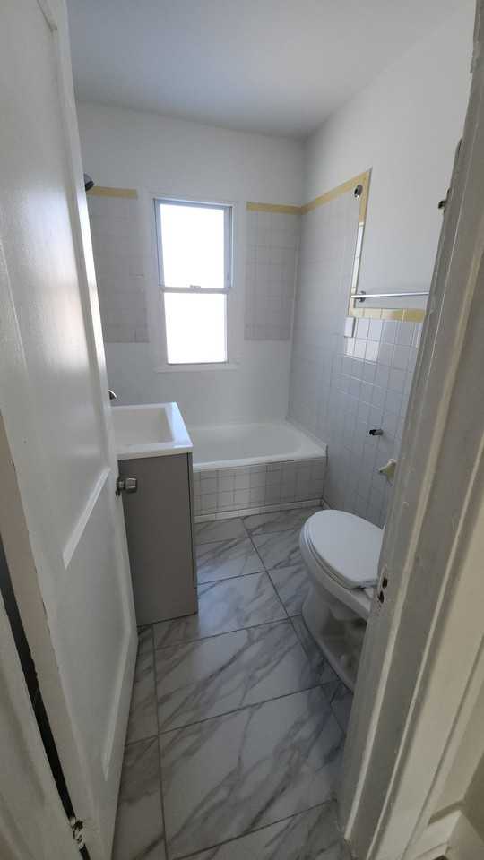 7005 Orchard Ave - Photo 7 of 9