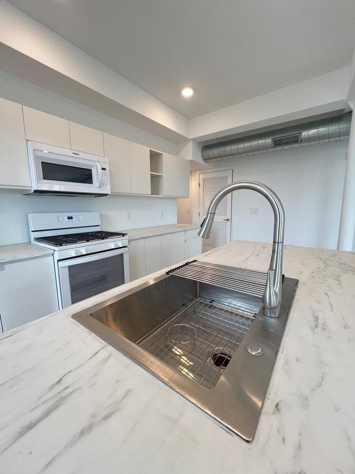 141 Christopher Columbus Dr #3 - Photo 5 of 29