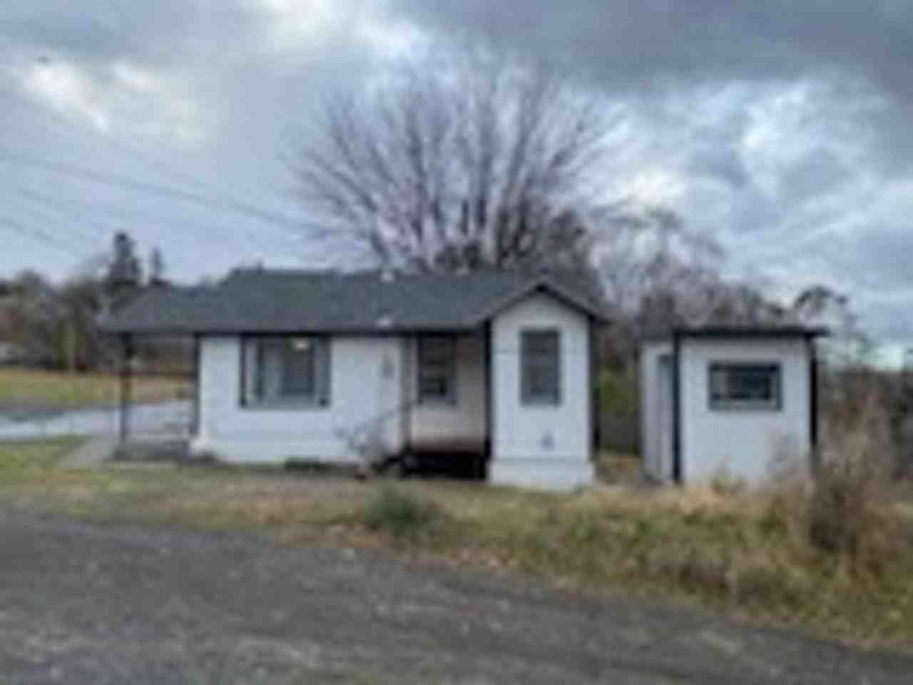 301 Sw Isaac Ave - Photo 3 of 13