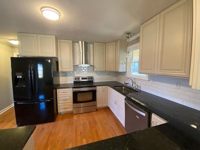 6407 Robinhood Ln Nw - Photo 2 of 8