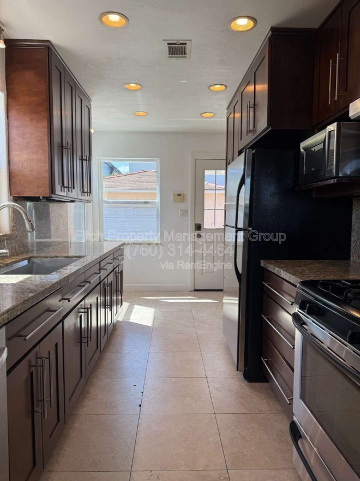 6241 Stewart St - Photo 4 of 28