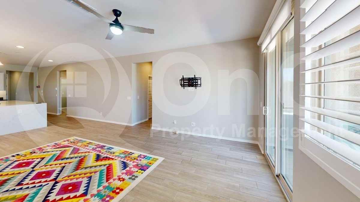 10942 E Tesla Ave - Photo 5 of 28