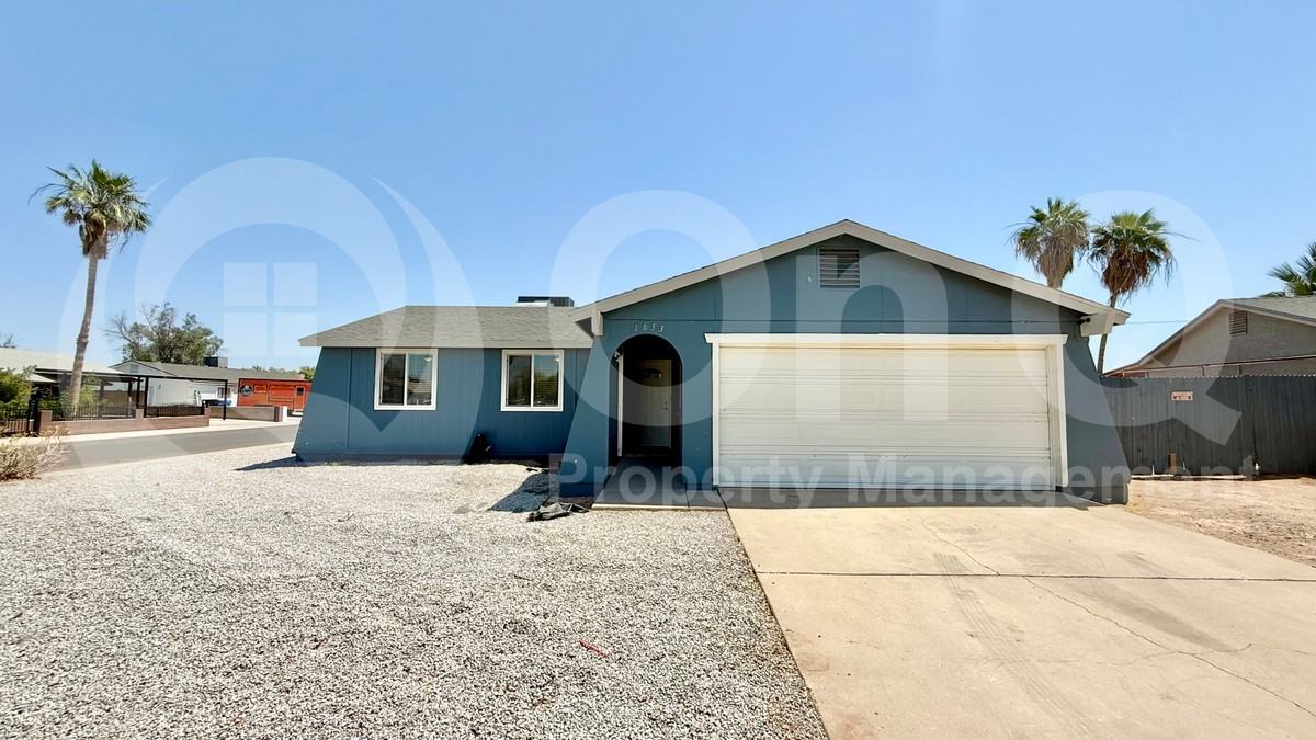 1653 N 69th Ave - Photo 4 of 19