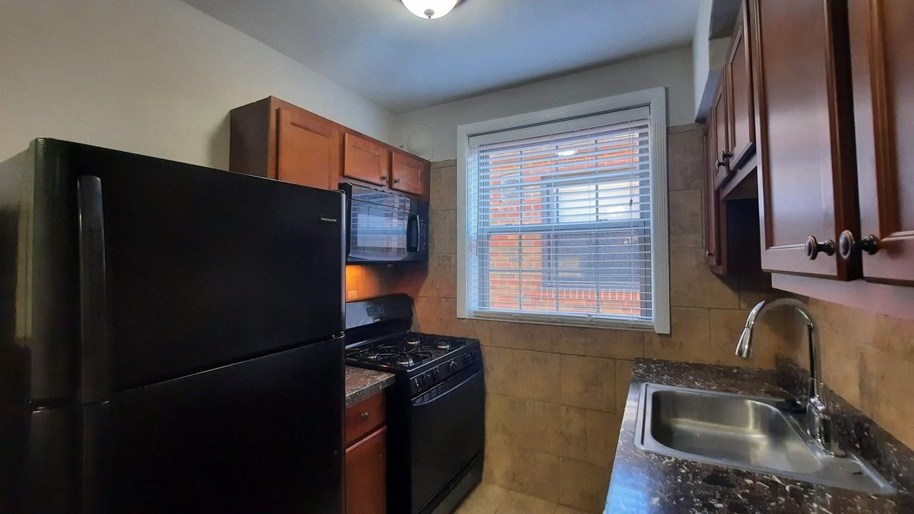 6362 Sutherland Ave #1stFL - Photo 3 of 11