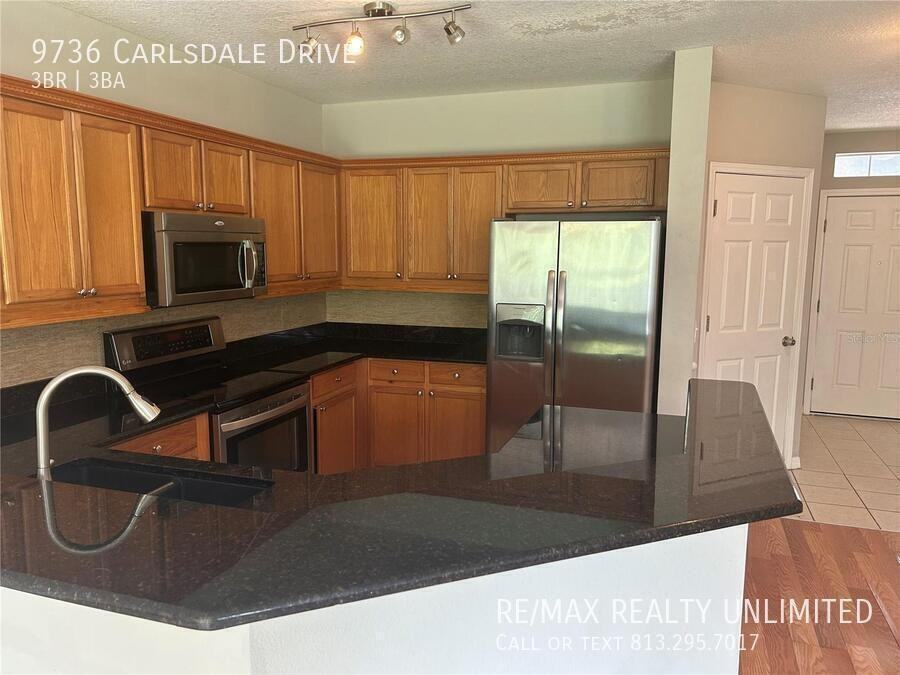 9736 Carlsdale Dr - Photo 4 of 11