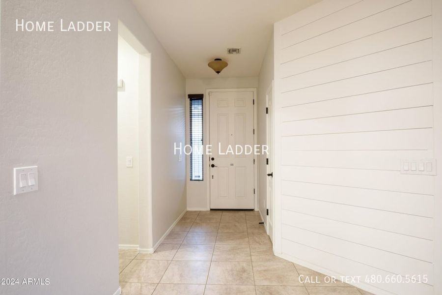 12123 W Rowel Rd - Photo 2 of 16