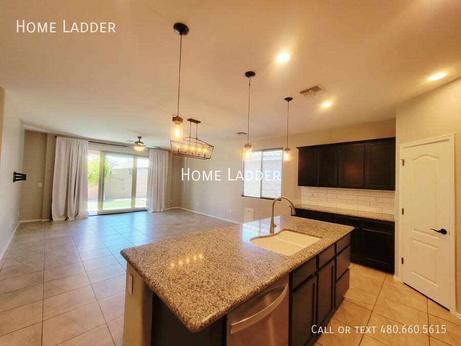 12123 W Rowel Rd - Photo 6 of 16