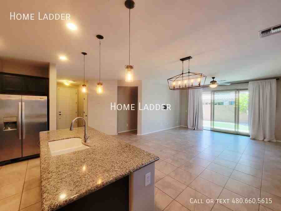 12123 W Rowel Rd - Photo 7 of 16