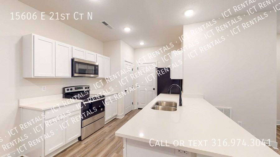 15606 E 21st Ct N - Photo 5 of 29
