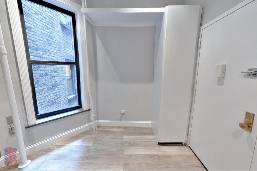 358 W 51st St - Photo 2 of 4