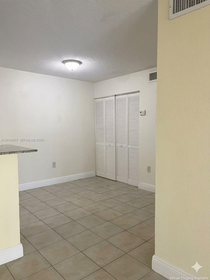 7115 Nw 179th St #106 - Photo 2 of 13