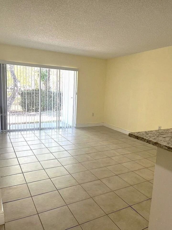 7115 Nw 179th St #106 - Photo 3 of 13