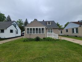 featured image of 303 E 14th St