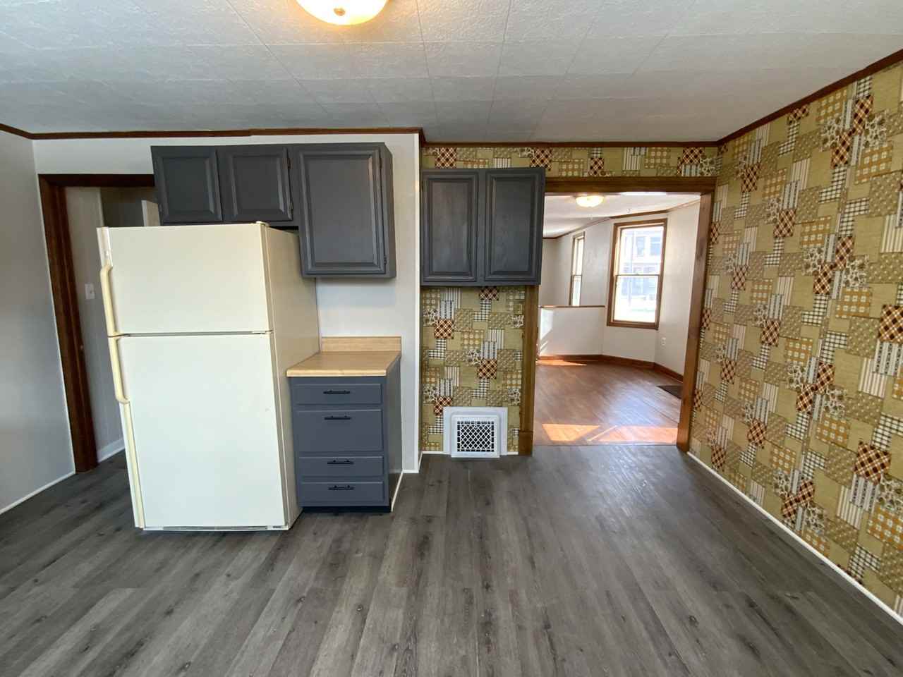 121 N 28th Ave W - Photo 4 of 18