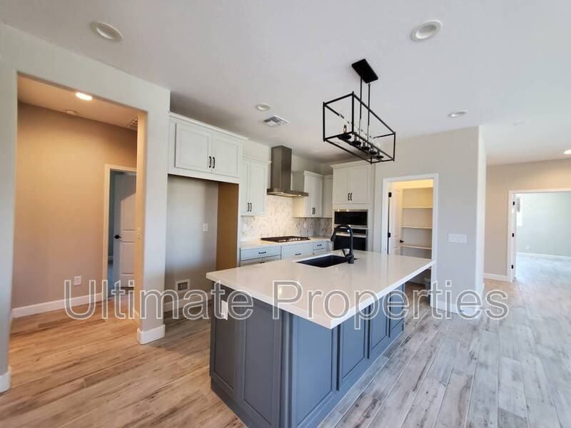 835 N 110th Ave - Photo 4 of 14