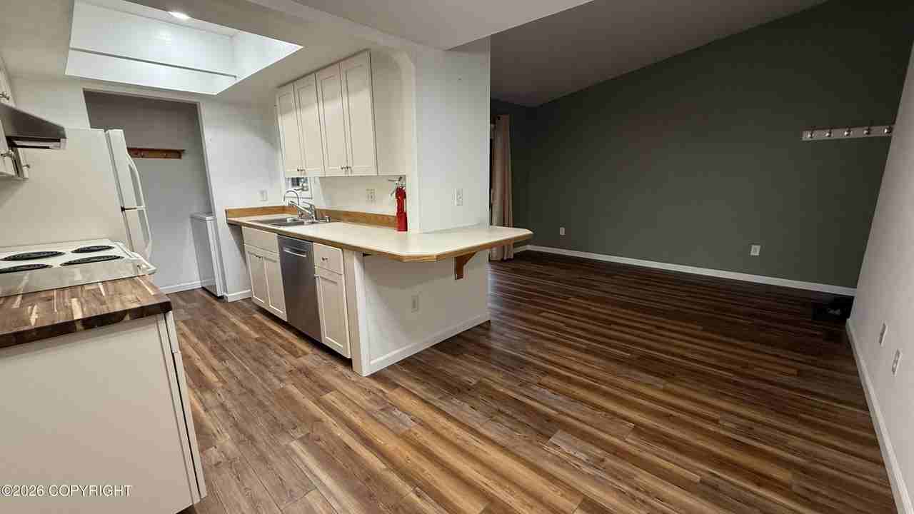 430 E 56th Ave #1D - Photo 2 of 16