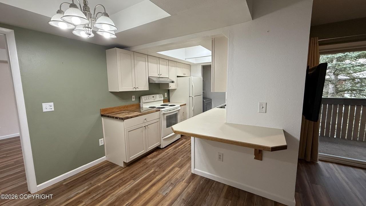 430 E 56th Ave #1D - Photo 3 of 16