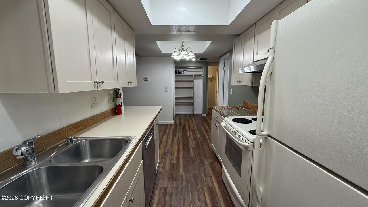 430 E 56th Ave #1D - Photo 5 of 16