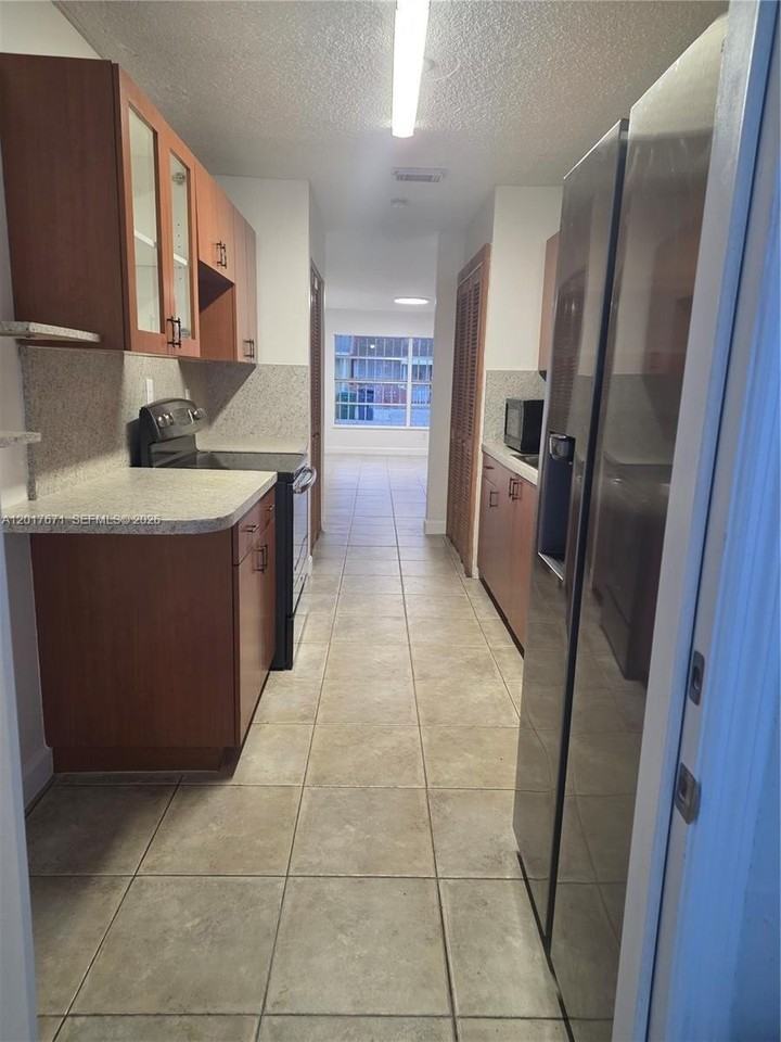 4467 Nw 185th St - Photo 4 of 15